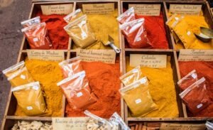 pexels photo 1058035 1058035 Vibrant spices displayed at a local market in Nice, France, showcasing diverse colors and flavors.